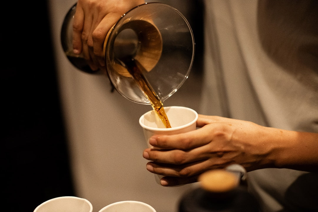 Coffee being poured into a cup